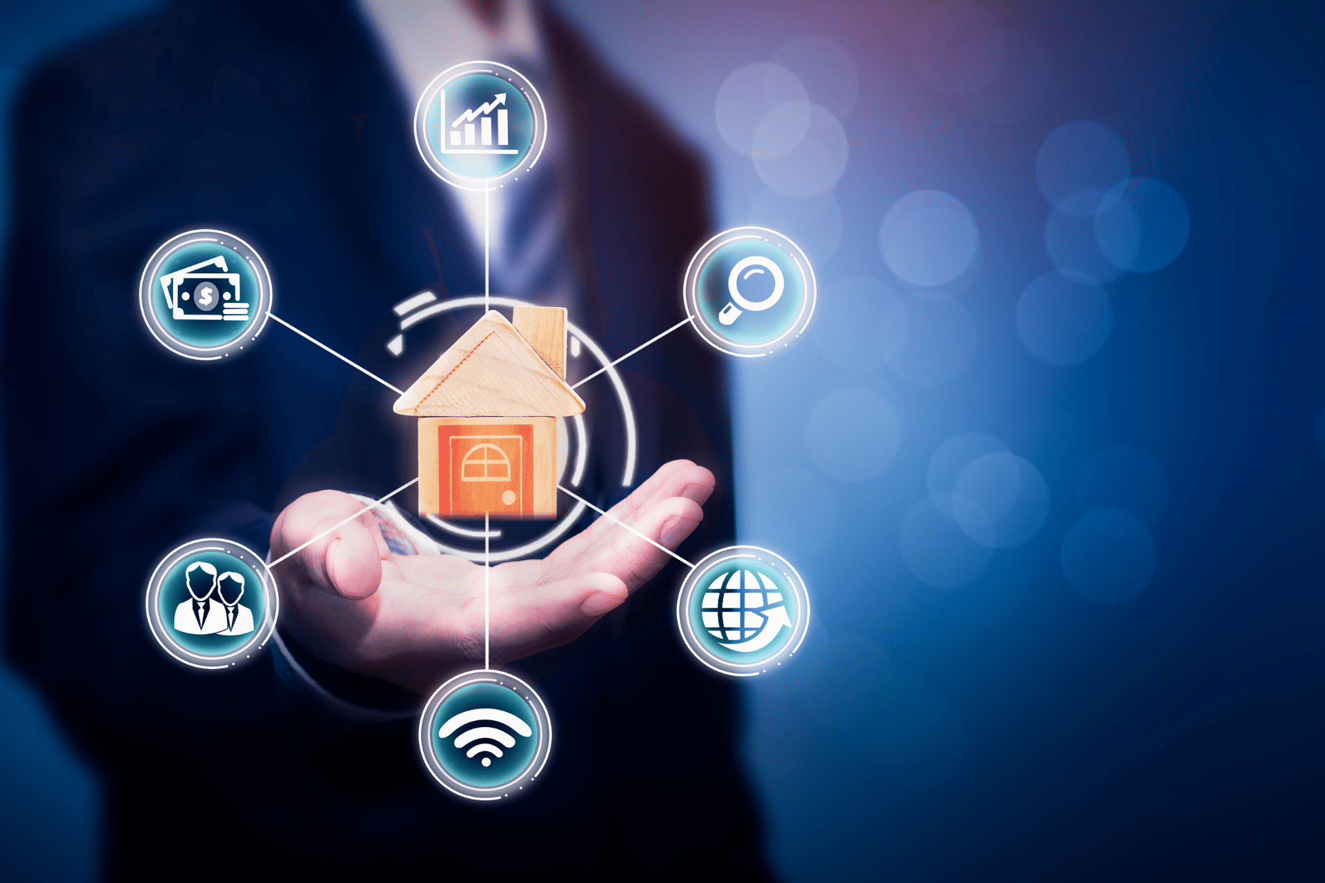 A man holding his hand out open faced with a digital house hovering above it with different digital icons circled around it.